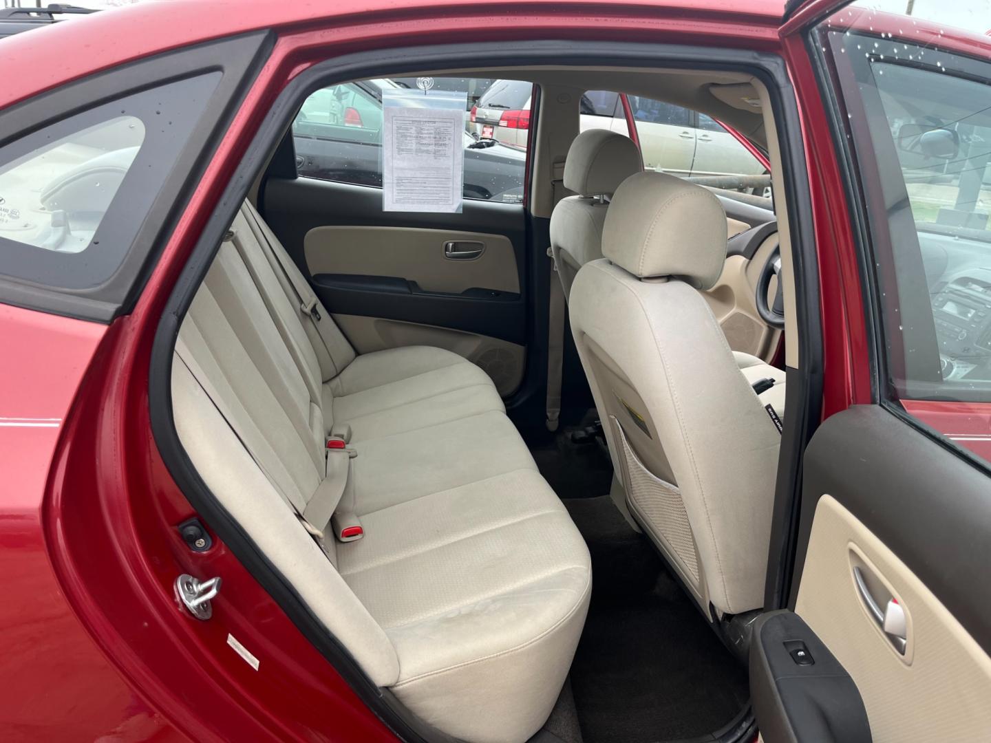 2008 red /TAN Hyundai Elantra GLS (KMHDU46D78U) with an 2.0L L4 DOHC 16V engine, Manual transmission, located at 14700 Tomball Parkway 249, Houston, TX, 77086, (281) 444-2200, 29.928619, -95.504074 - Photo#12